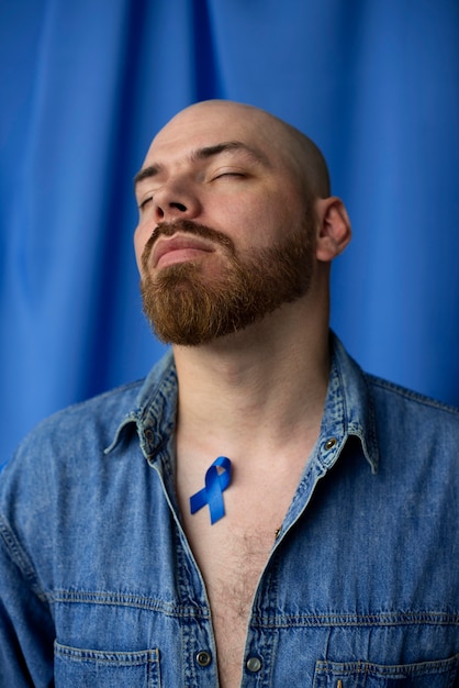 Man with blue november ribbon