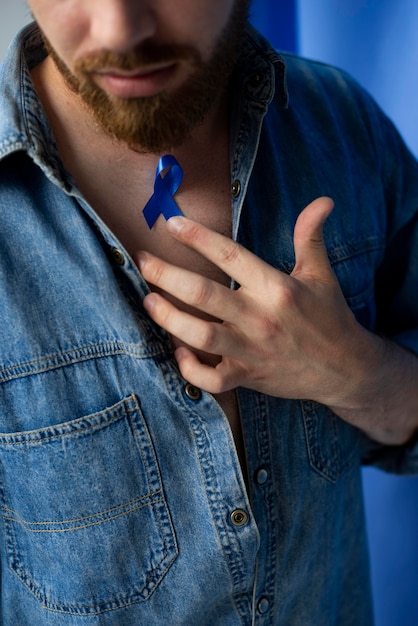 Man with blue november ribbon