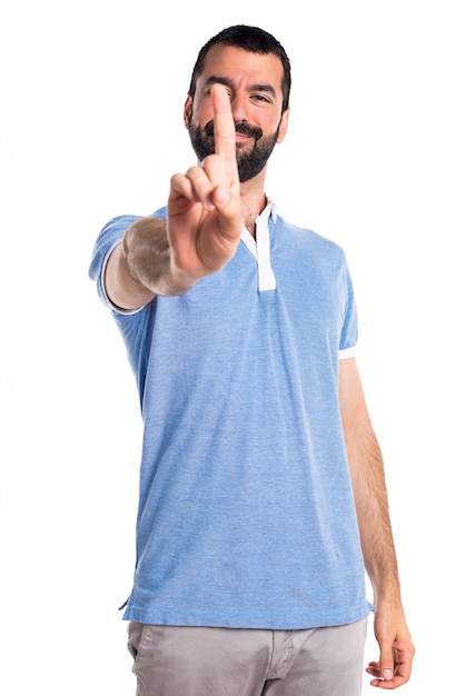 Man with blue shirt counting one