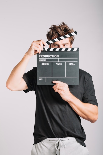 Man with clapperboard