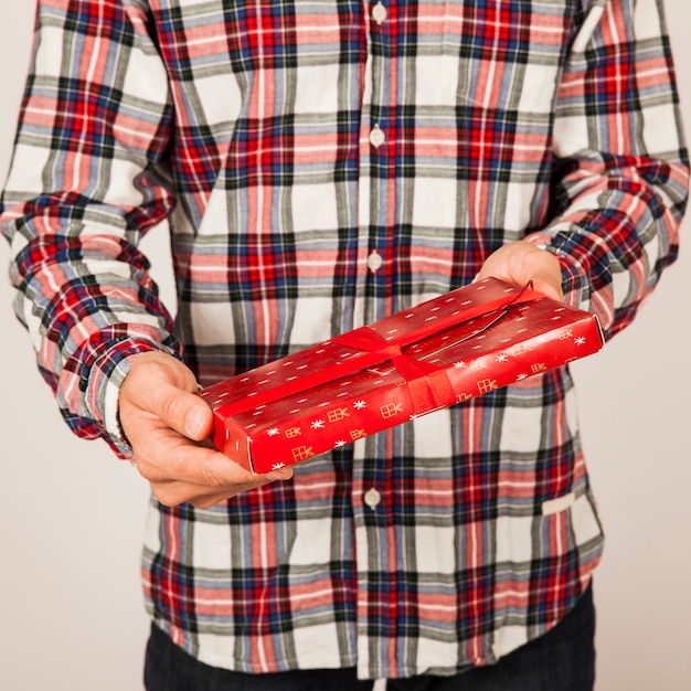 Man with flat gift box