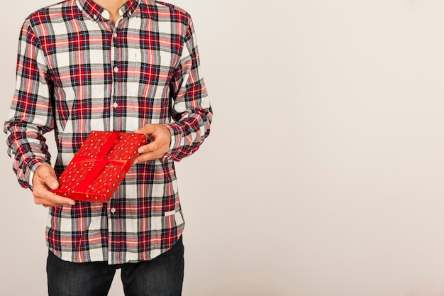 Free Photo man with gift box in hands