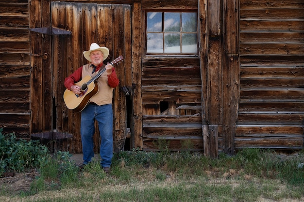 Man with guitar getting ready for country music concert