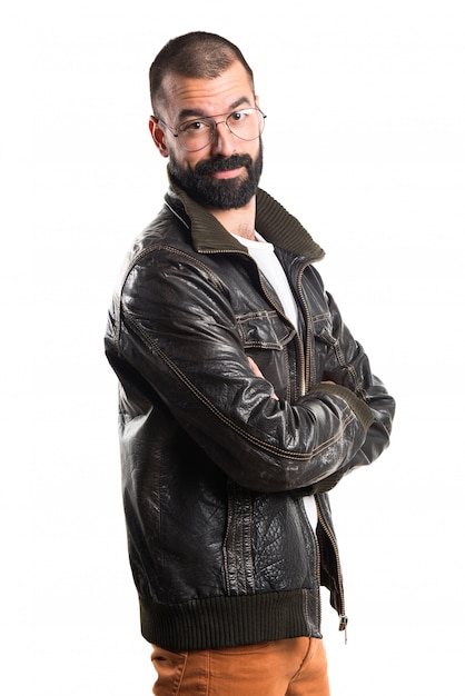 Man with leather jacket with his arms crossed