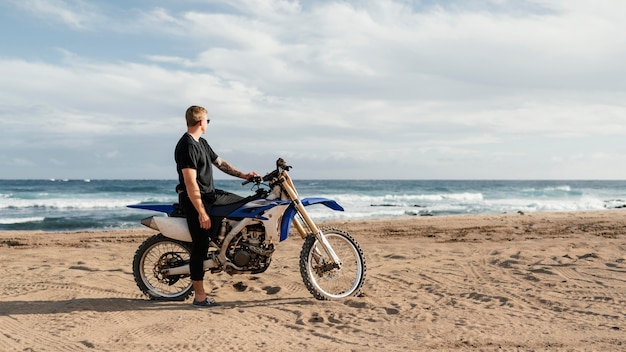 Man with motorcycle in hawaii