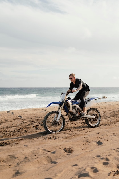 Man with motorcycle in hawaii