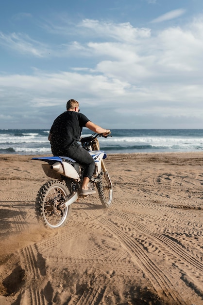 Man with motorcycle in hawaii