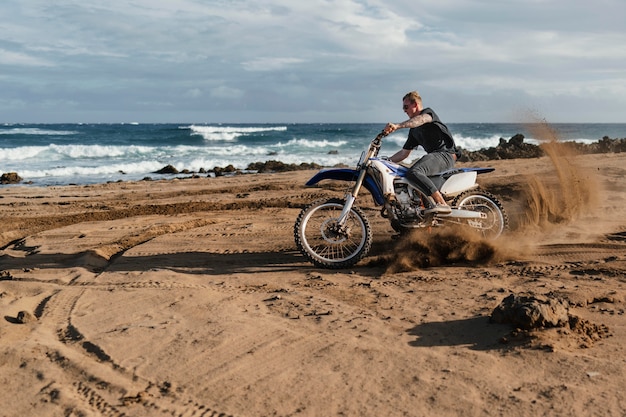 Man with motorcycle in hawaii