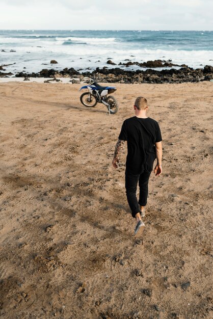 Man with motorcycle in hawaii