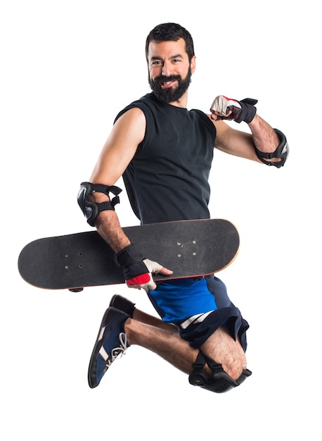 Man with skateboard jumping