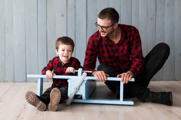 Free Photo man with son on fathers day