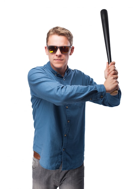 Man with sunglasses and a baseball bat