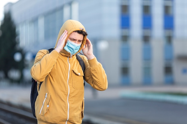 Man with surgical mask outdoor