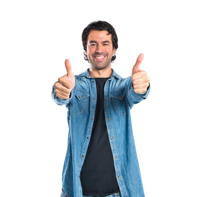 Man with thumb up over white background