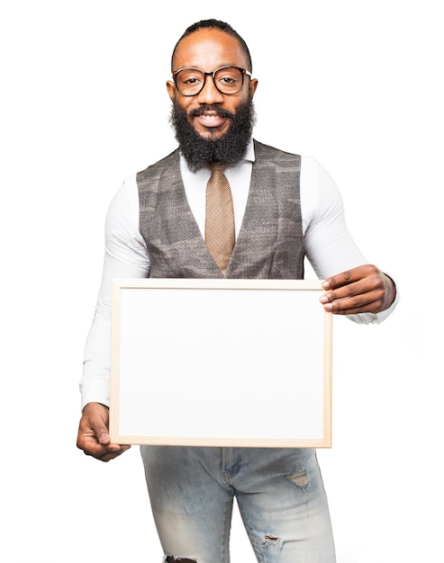 Free photo man with tie holding a white board