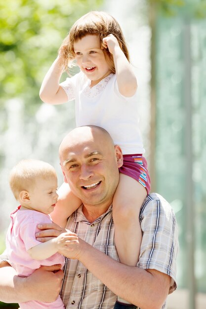 man with two children