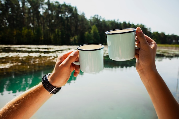 Man and woman cheering about being outdoors together