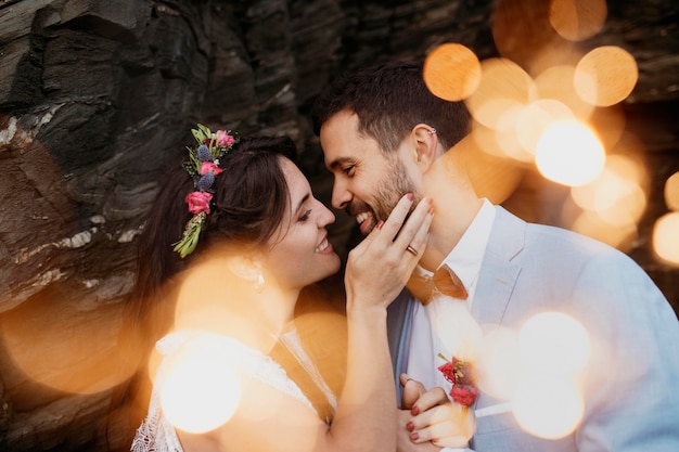 Free photo man and woman having a beach wedding