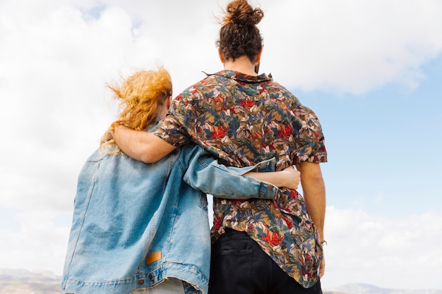 Free photo man and woman locked in embrace