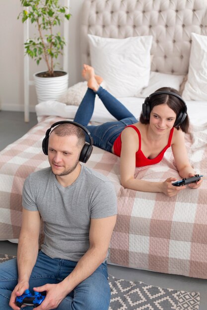 Man and woman playing videogames