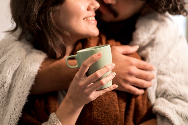 Man and woman relaxing together at home