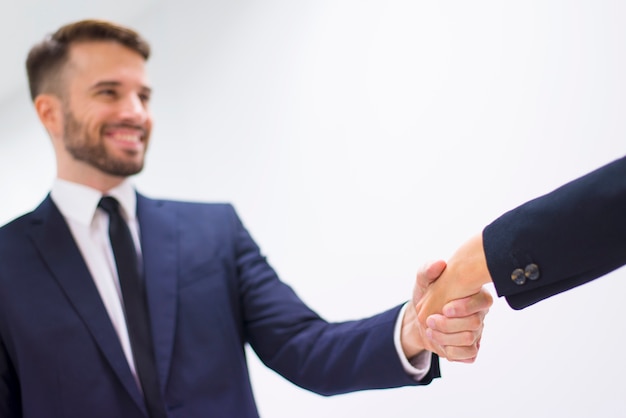 Free photo man and woman shaking hands