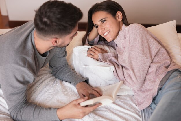 Man and woman smiling at each other