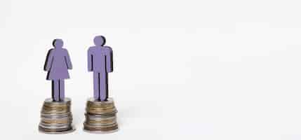 Free photo man and woman standing on piles of coins