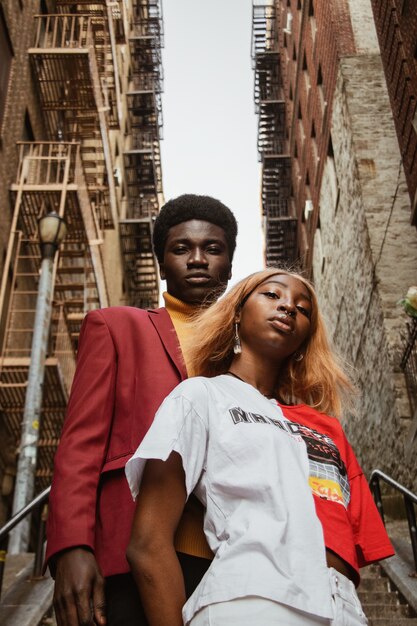 Man and woman standing on stairs