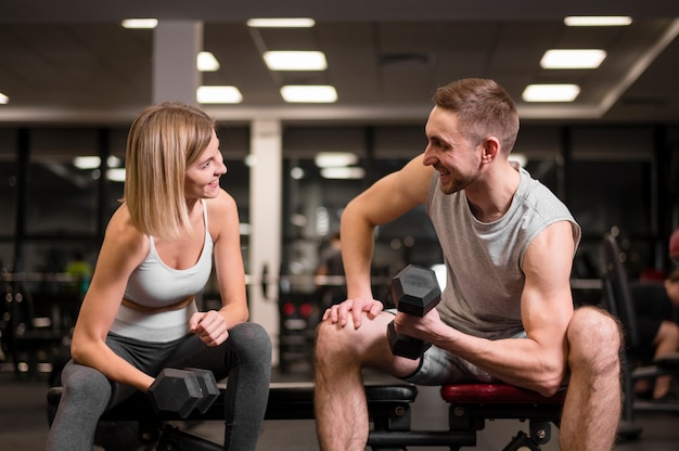 Man and woman working out together