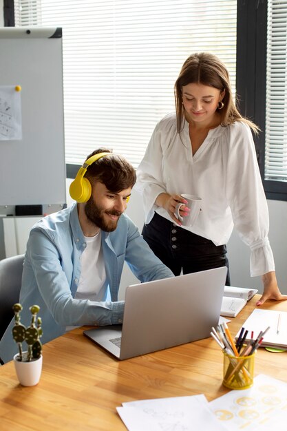 Man and woman working together in a startup company