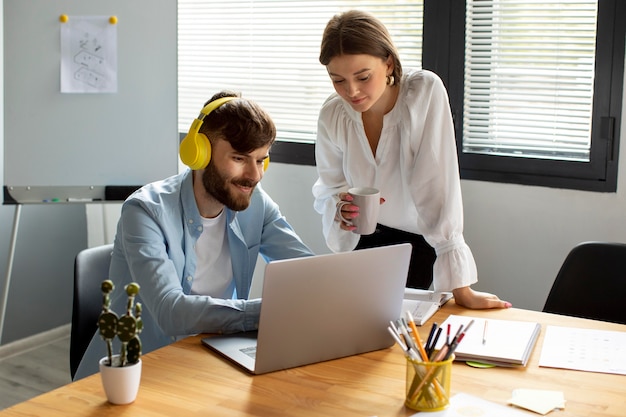 Man and woman working together in a startup company