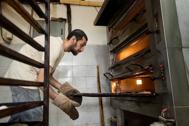 Man working in a bread bakery