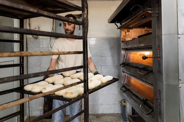 Man working in a bread bakery