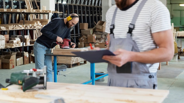 Man working on cutting mdf board