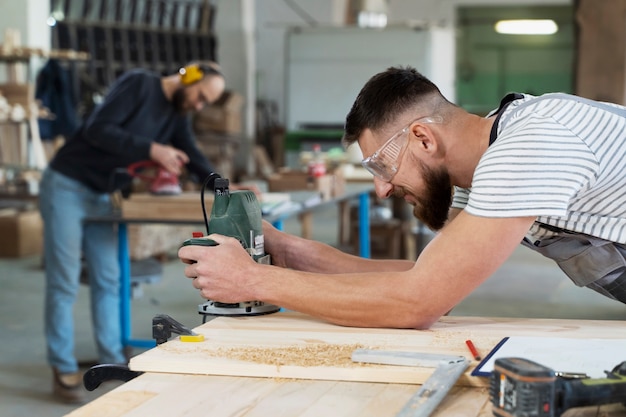 Man working on cutting mdf board