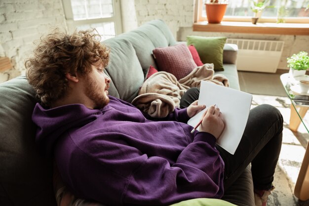 Man working from home during coronavirus or COVID-19 quarantine