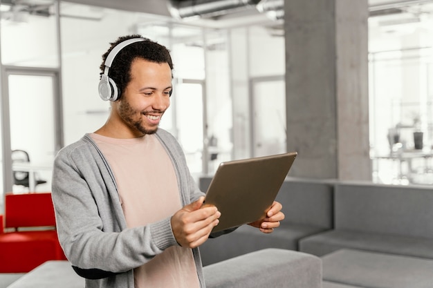 Man working on a laptop in the company