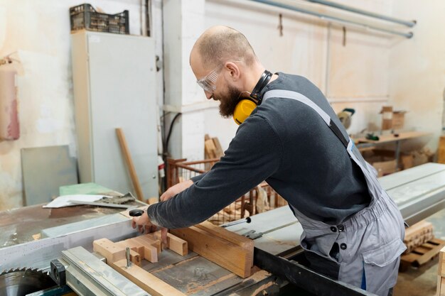 Man working in a mdf boards warehouse