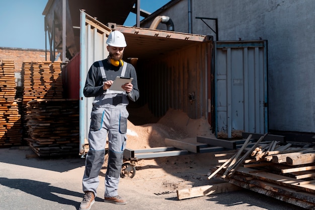 Man working in a mdf boards warehouse