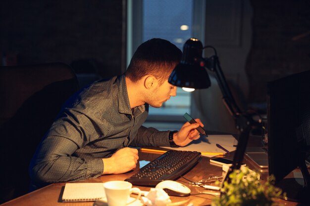 Man working in office alone