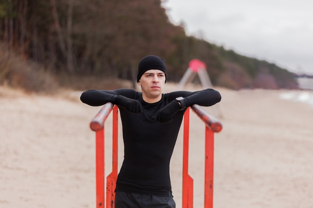 Free Photo man working out on beach