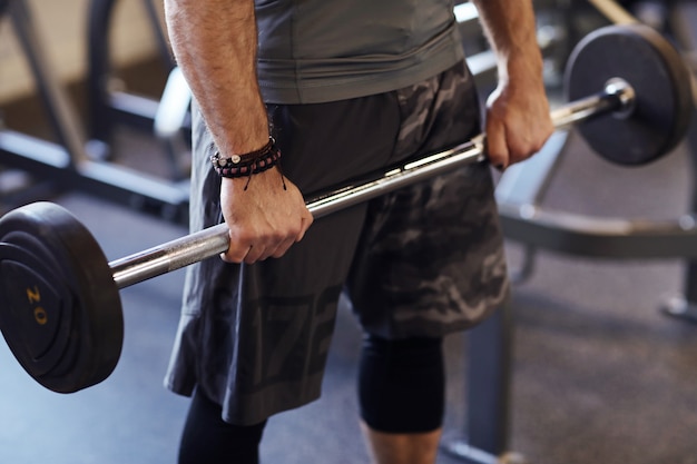 Free photo man working out in gym