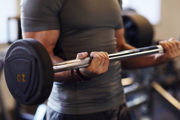 Free photo man working out in gym