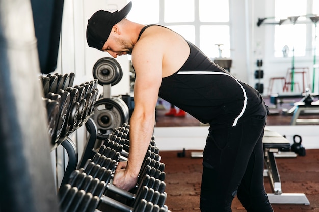 Free Photo man working out in the gym