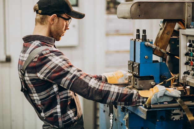 Free Photo man working on steel fatory and equipment for steel production