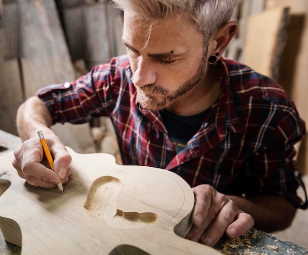 Free Photo man working with wood