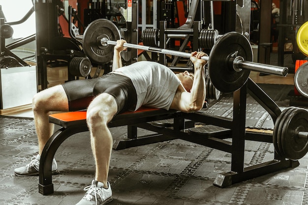 Man workingout in the local gym