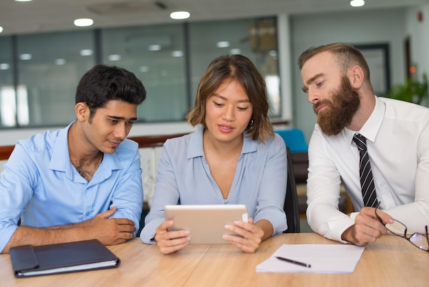 Managers analyzing sales results