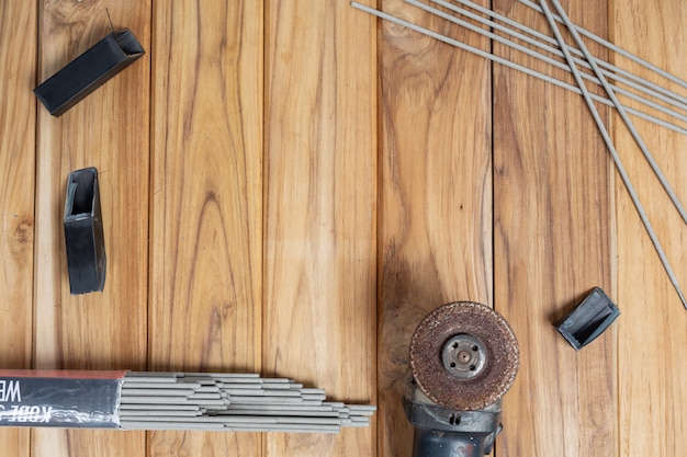 Manual tool set, set on wooden floor.